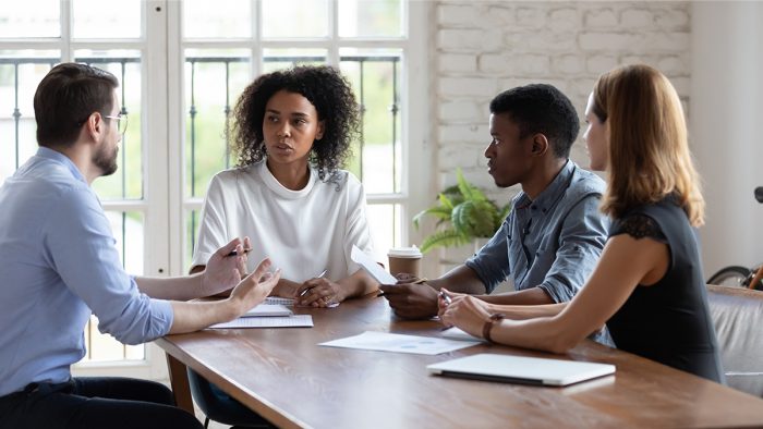 Diverse group at a meeting table