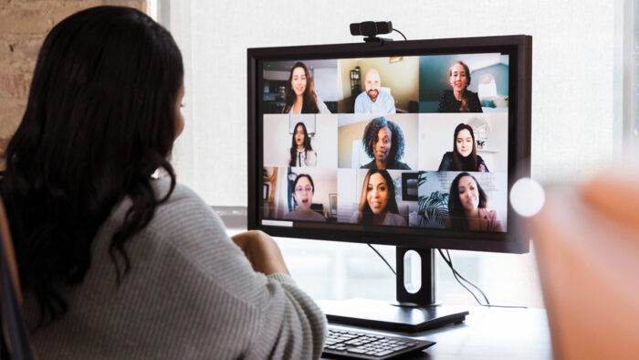 woman on a zoom call with her team