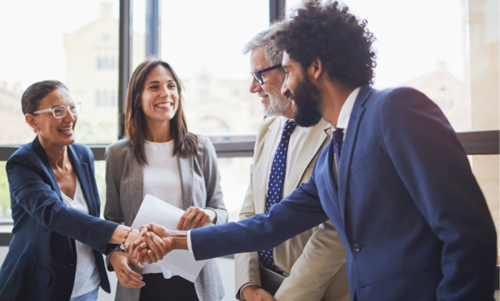 Business concepts two people shaking hands