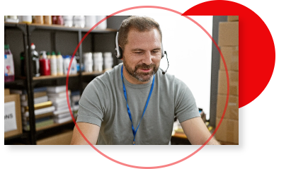 man sitting with headphones on 